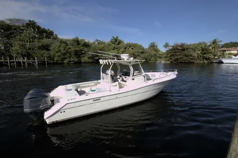 2001 Pursuit 3070 Center Console, photo 1 in Fort Lauderdale, FL